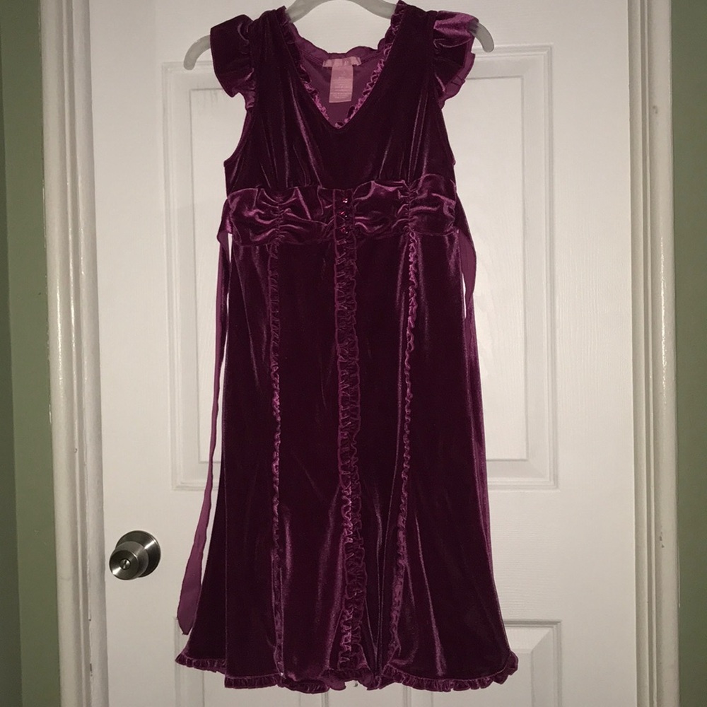 Pink formal dress for a kid.